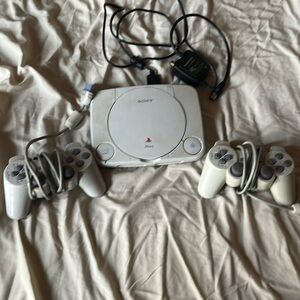 PlayStation with two controllers